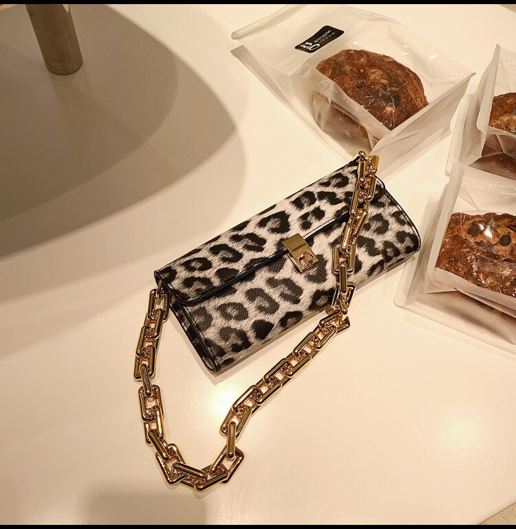 Soft Voluminous Clutch With Square Ring Chain Shoulder