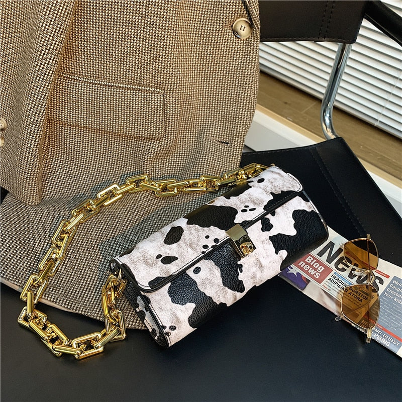 Soft Voluminous Clutch With Square Ring Chain Shoulder