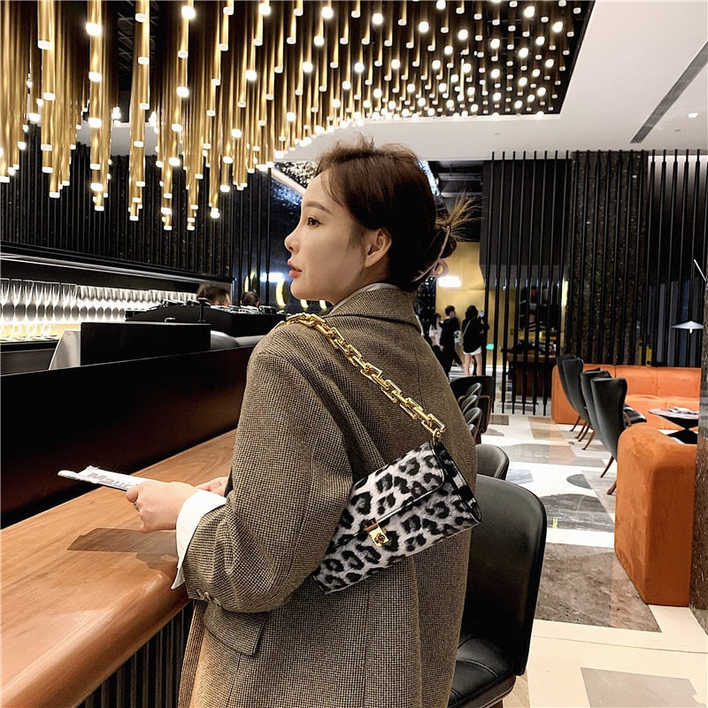 Soft Voluminous Clutch With Square Ring Chain Shoulder