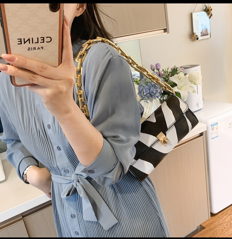 Soft Voluminous Clutch With Square Ring Chain Shoulder