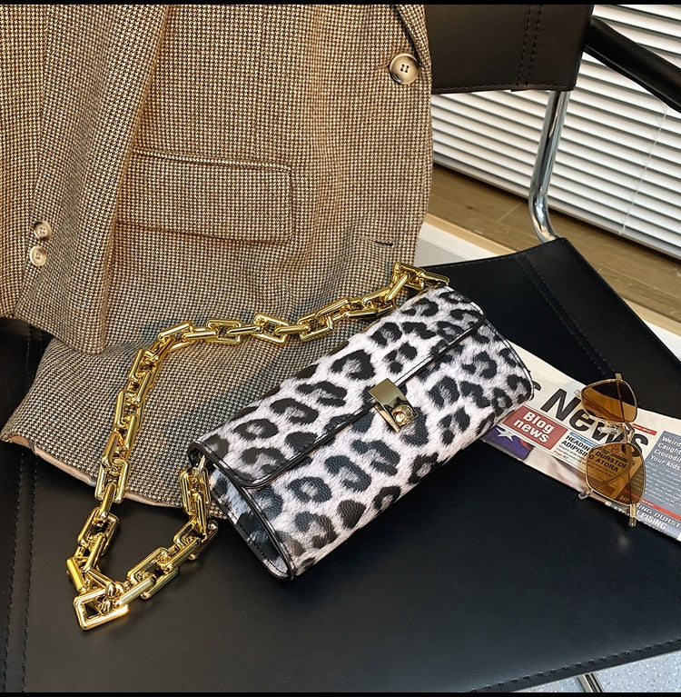 Soft Voluminous Clutch With Square Ring Chain Shoulder